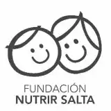 Logo of Fundación Nutrir Salta featuring two simple, smiling child faces drawn with black lines above the organization's name in bold and regular text.