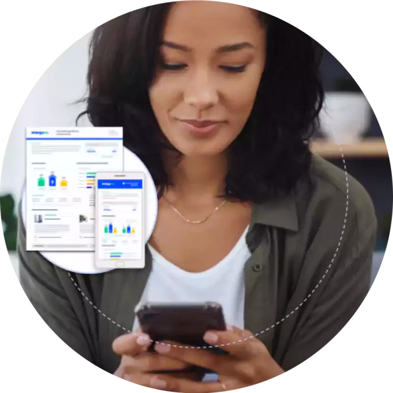 Woman looking at her smartphone with digital reports and charts displayed beside her, suggesting she is reviewing data or analytics on her device.